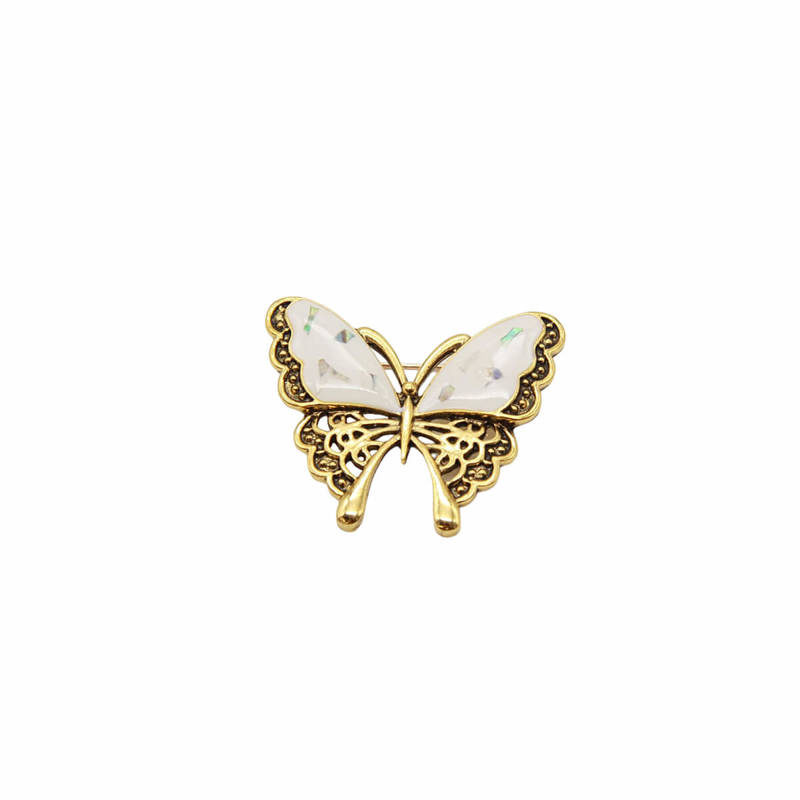 Złota broszka motyl